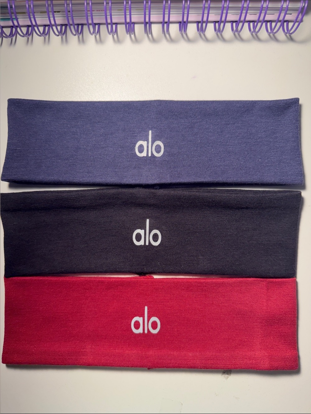 Alo 3-Pack Stretch Headbands — Purple, Black, Red